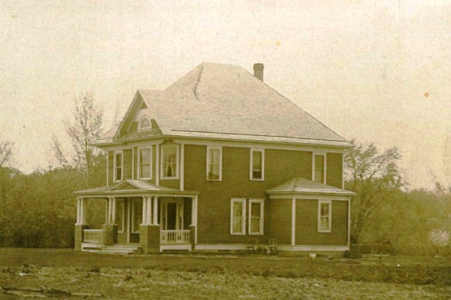 A vintage photo of the original farmhouse a Radford #553!